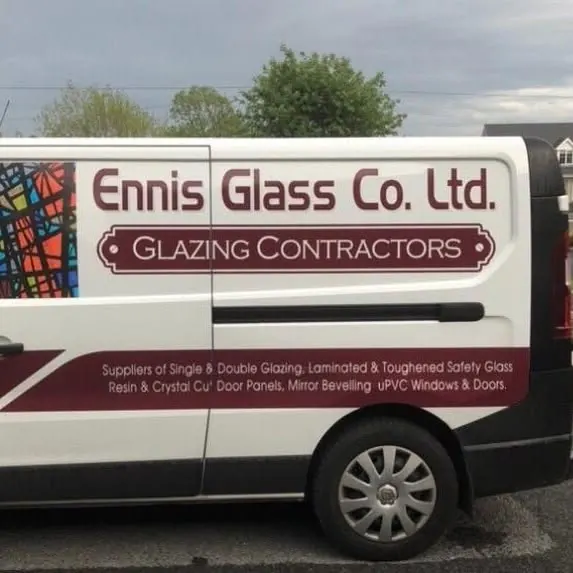 Ennis Glass Co. van with glazing contractor branding